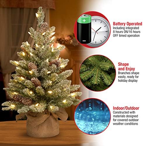 Национална компанија за дрво пред-осветлена вештачка мини новогодишна елка | Вклучува мали бели LED светла и база на торби за ткаенини | Снежен